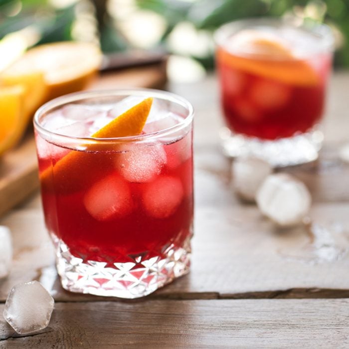 Negroni Cocktail with orange and ice.