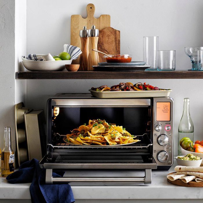 Williams Sonoma toaster oven with nachos and beer