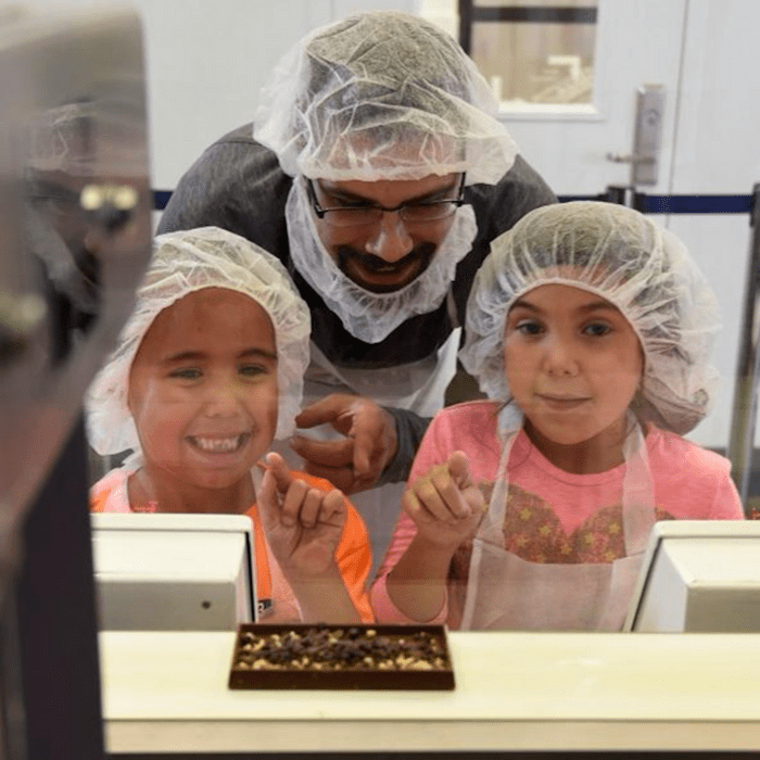 Children looking at chocolate at Hershey's World