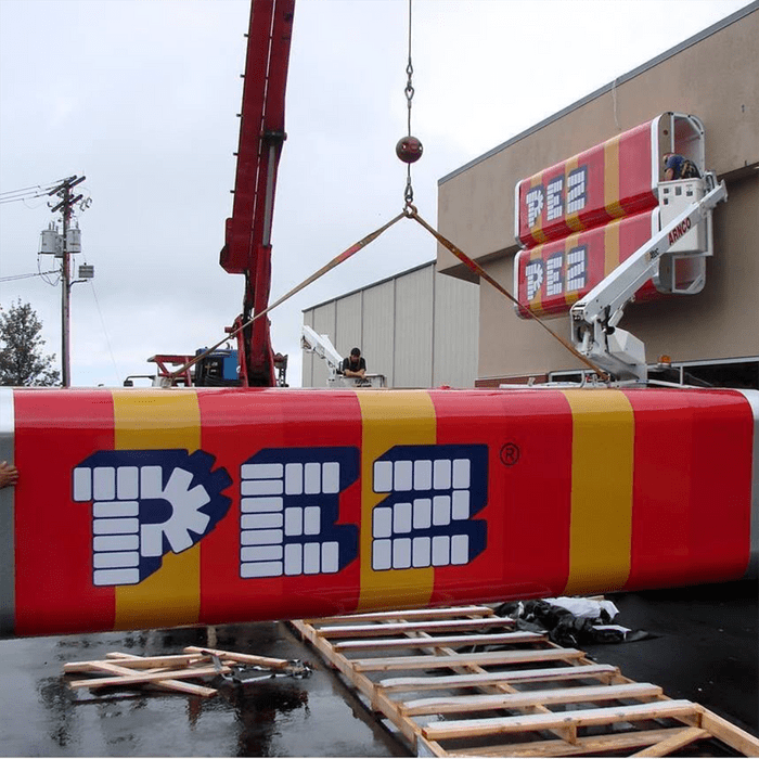 Huge signs shaped like pez candy