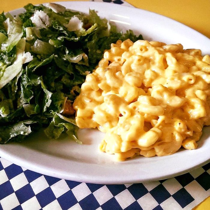 Mac and cheese and greens on a plate