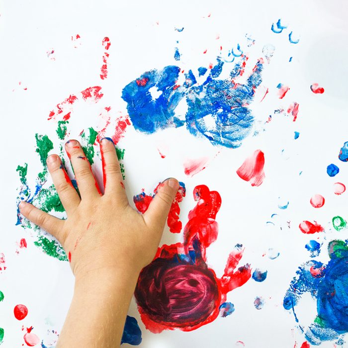 A child finger paints