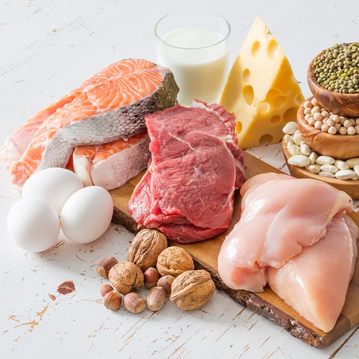 Selection of protein sources in kitchen background,