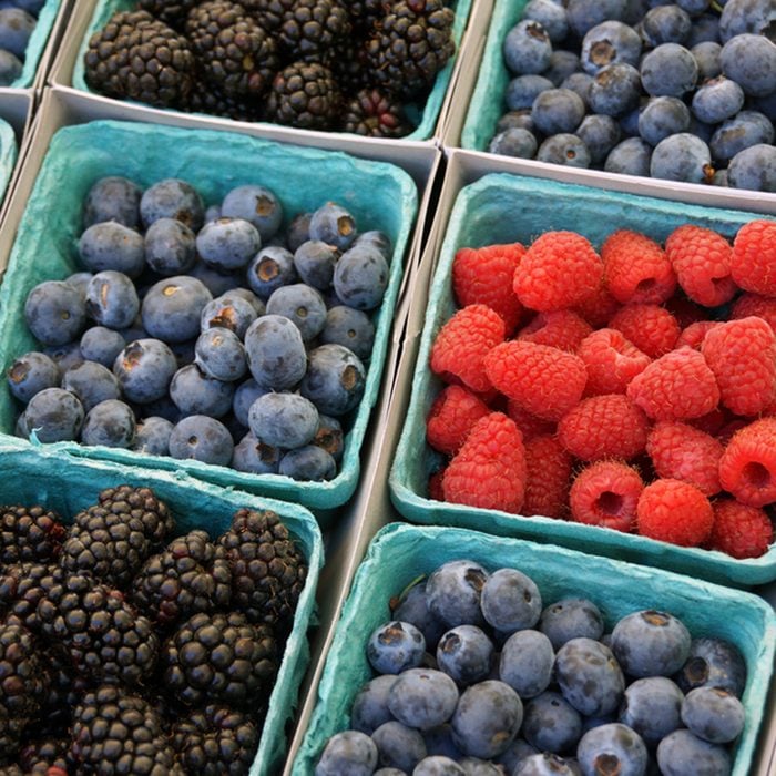 Baskets of berries at the farmers market