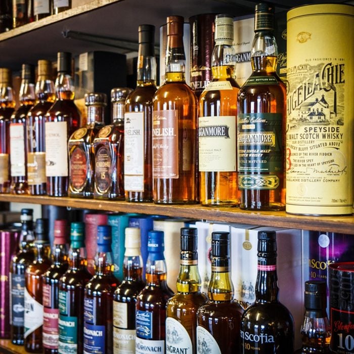Various bottles of Scotch whisky on the shelf
