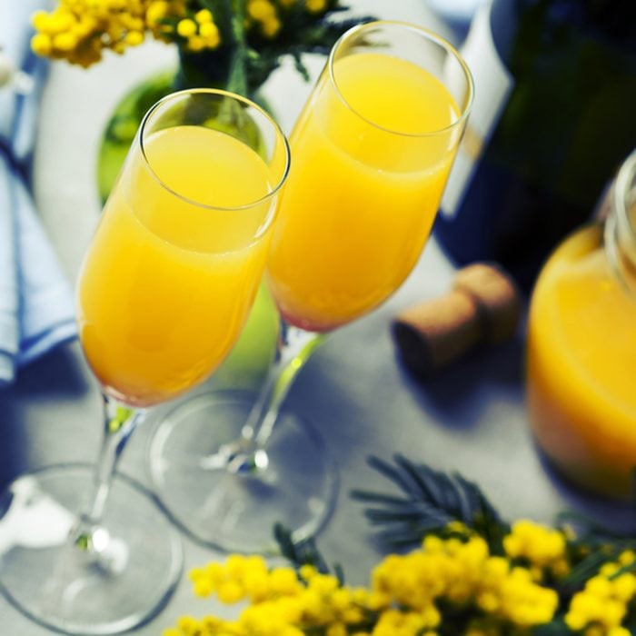 Two glasses with mimosa cocktail