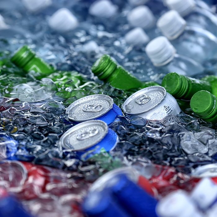 beer and soda bottles in the ice