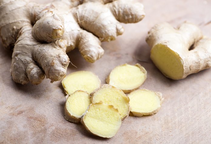 Ginger on wood. Food; Shutterstock ID 782571577; Job (TFH, TOH, RD, BNB, CWM, CM): TOH Fall Spices