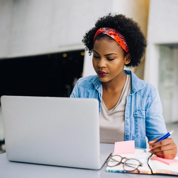 woman reseaching on computer