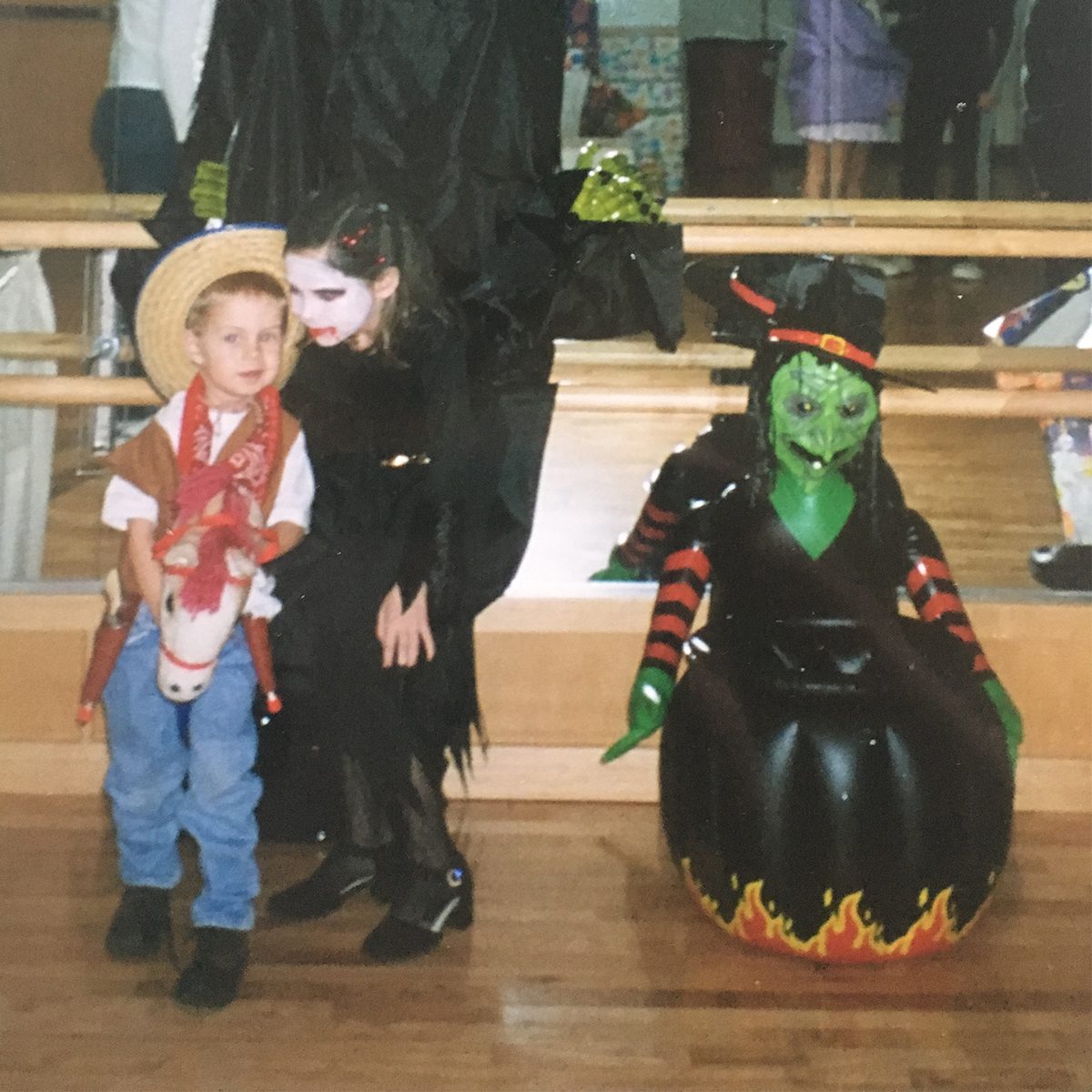 children dressed in costumes for Halloween