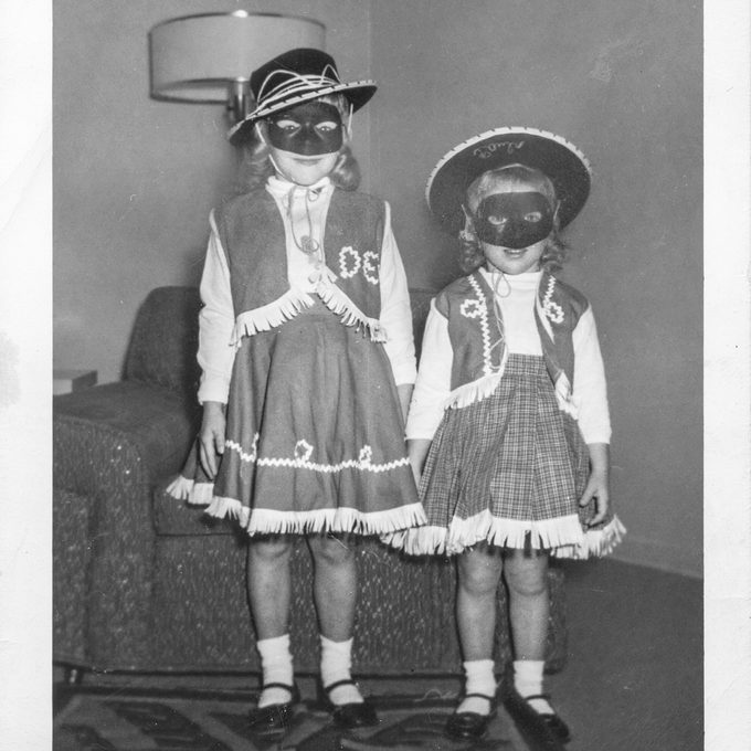 sisters dressed as cowgirls for Halloween