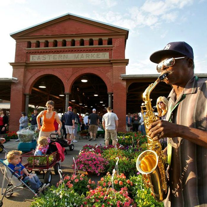 Man playing the saxophone at Eastern Market
