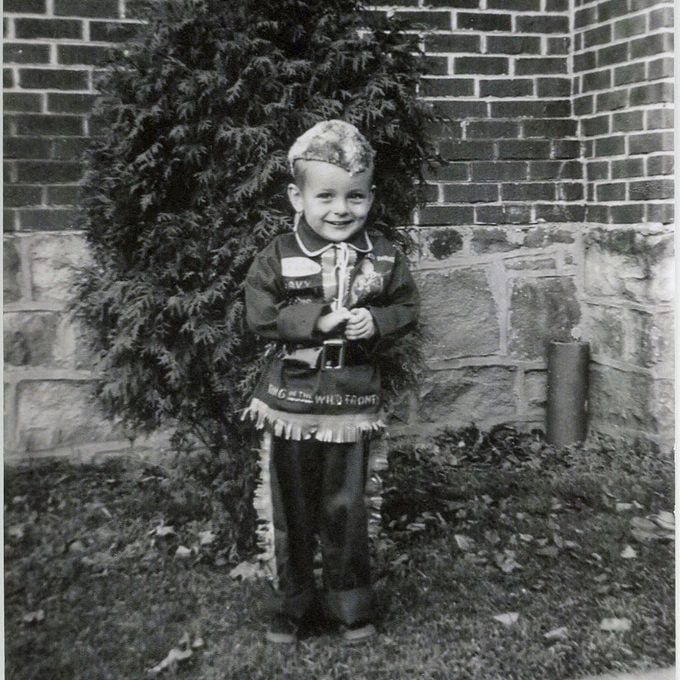 small boy in Davey Crocket Halloween Costume