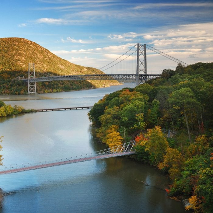 Hudson River valley in Autumn with colorful mountain and Bridge over Hudson River.