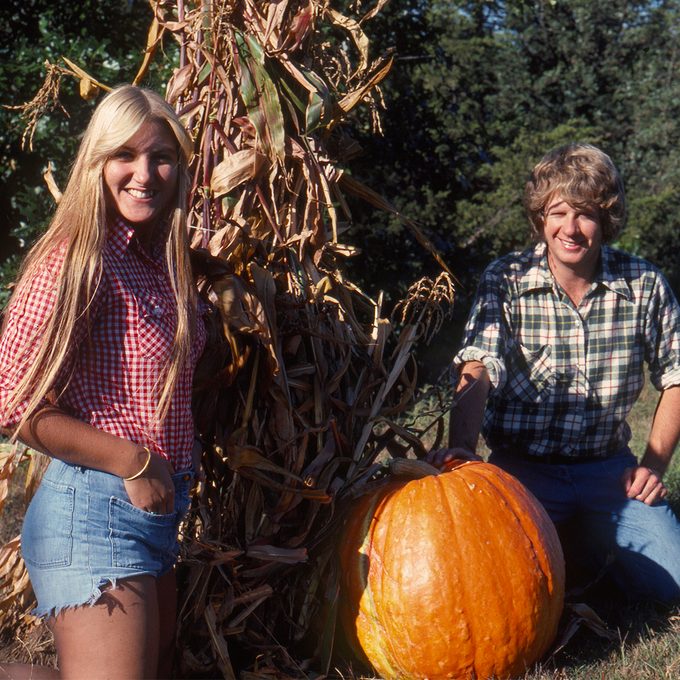 brother and sister at a pumpkin patch