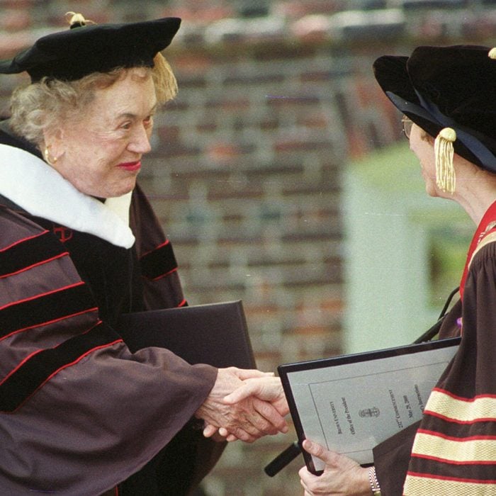 Julia Child, center, is congratulated after receiving an honorary doctorate of humane letters from Brown University in Providence, R.I., at graduation ceremonies