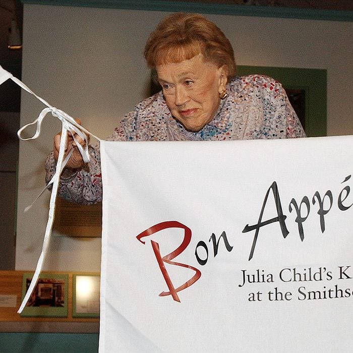 Julia Child pulls on apron strings to open her kitchen exhibition at the Smithsonian's National Museum of American History in Washington