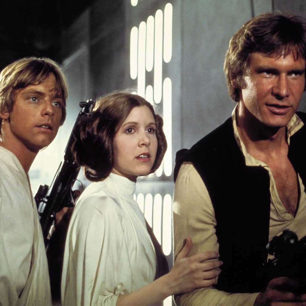 still of Star Wars A New Hope, Mark Hamill, Carrie Fisher, Harrison Ford
