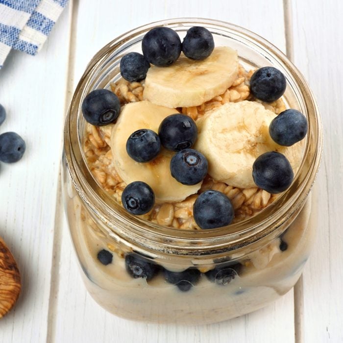 Blueberry and banana breakfast overnight oatmeal in a mason jar