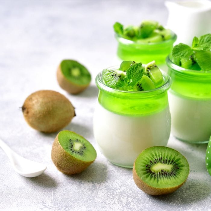 Panna cotta with kiwi jelly in a vintage jar on a light slate, stone or concrete background, traditional italian dessert.; Shutterstock ID 1060742771; Job (TFH, TOH, RD, BNB, CWM, CM): Taste of Home
