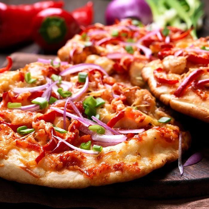 Pizza with chicken meat and vegetables