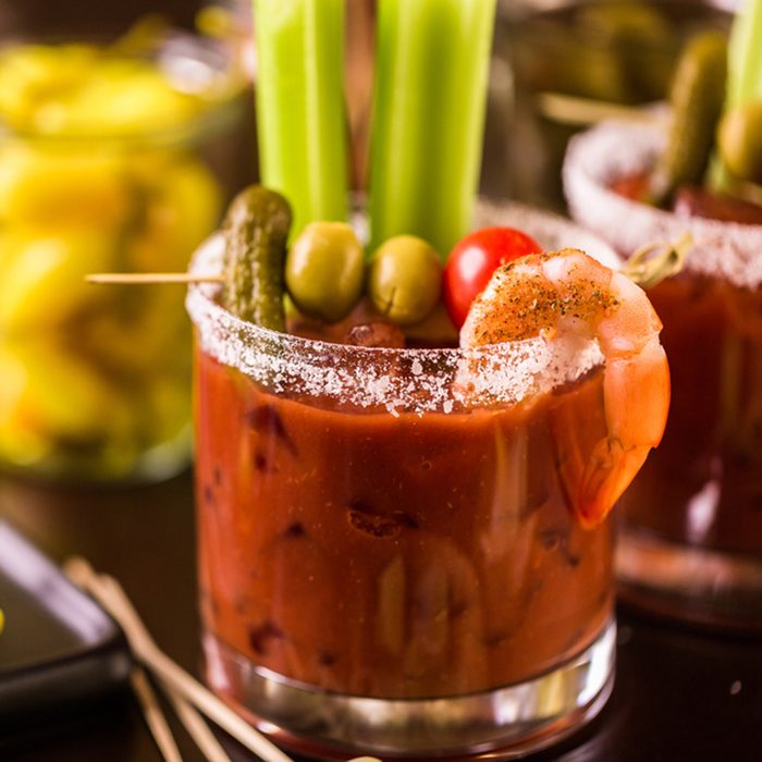 Bloody mary cocktail garnished with celery sticks and olives.; Shutterstock ID 722064856; Job (TFH, TOH, RD, BNB, CWM, CM): Taste of Home