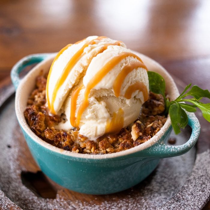 Apple Crumble Dessert with Ice Cream; Shutterstock ID 734025667; Job (TFH, TOH, RD, BNB, CWM, CM): Taste of Home