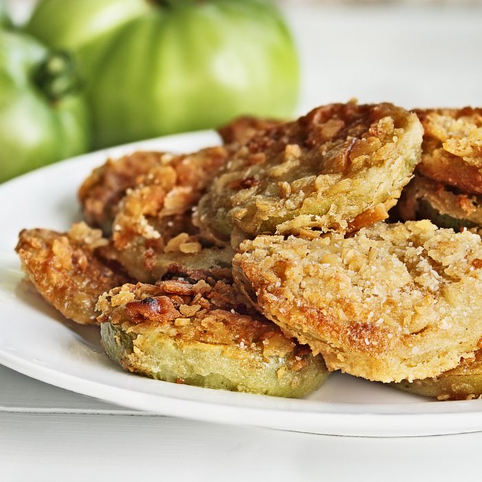 Plate of fresh fried green tomatoes. 