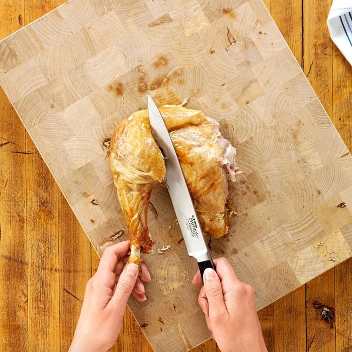 Carving a turkey - Separate the thigh and drumstick