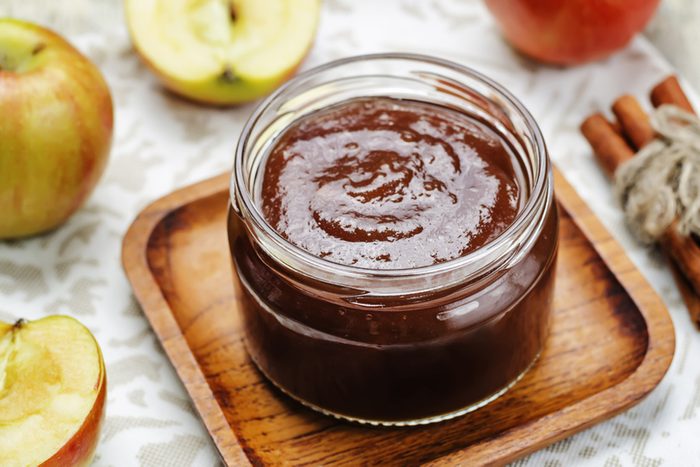 apple butter on wood background
