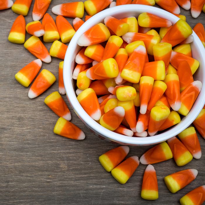 Classic white, orange and yellow candy corn sweets for Halloween
