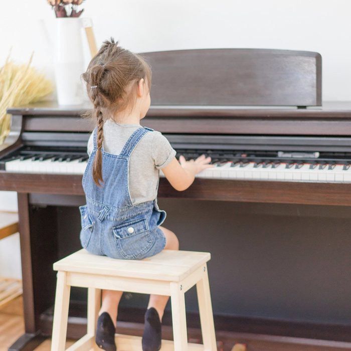 Child playing piano