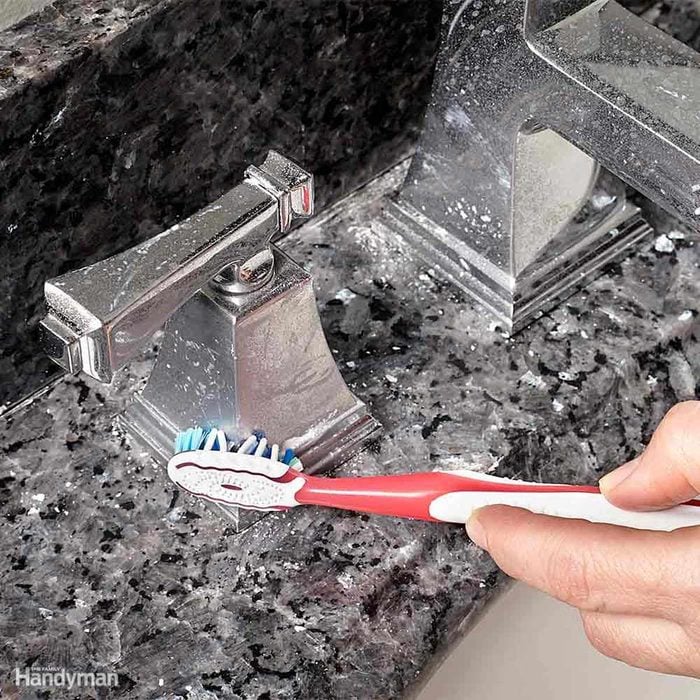 Cleaning with a toothbrush