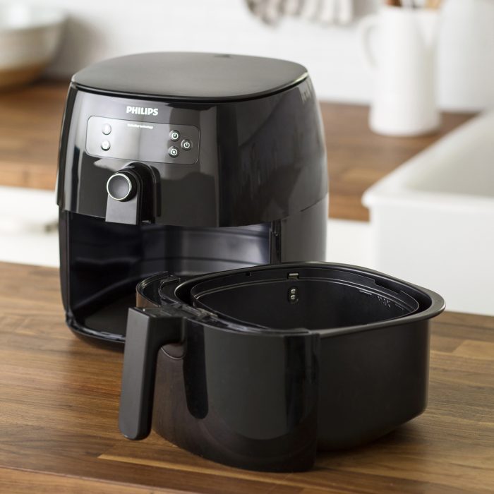 air fryer and removable basket on kitchen counter