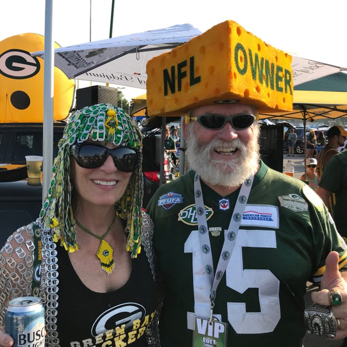 Packer fans during at tailgate party at Lambeau Field.