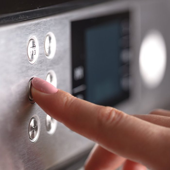 Pressing buttons on your oven