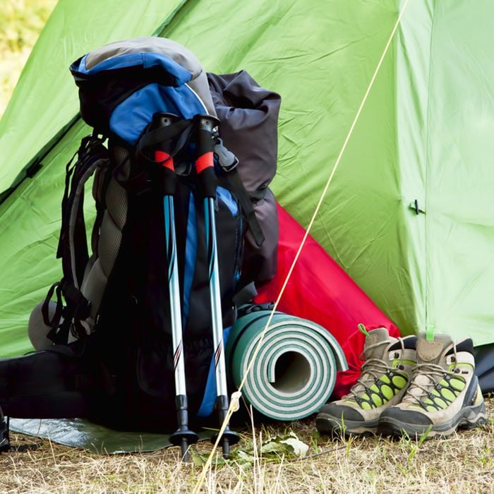 Mountain Camping Equipment with a Tent,Boots, Backpack, Trekking Poles and Sleeping Pad; Shutterstock ID 215842618; Job (TFH, TOH, RD, BNB, CWM, CM): Taste of Home