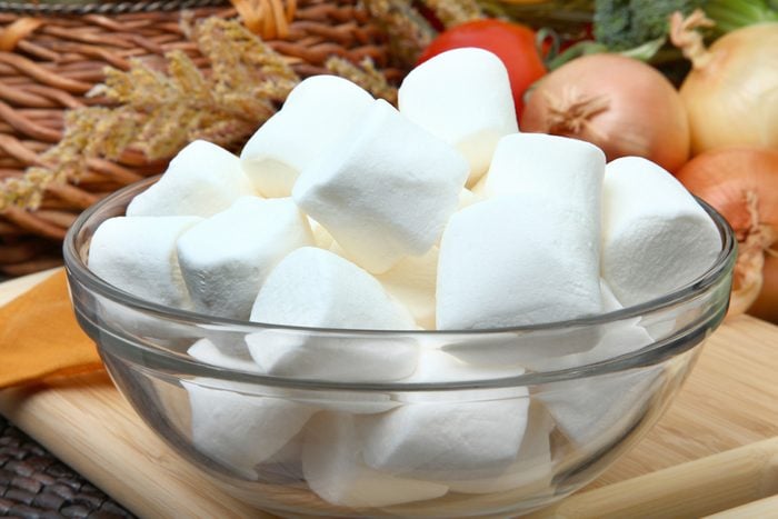 Glass bowl of white marshmallows in kitchen.; Shutterstock ID 41643064;