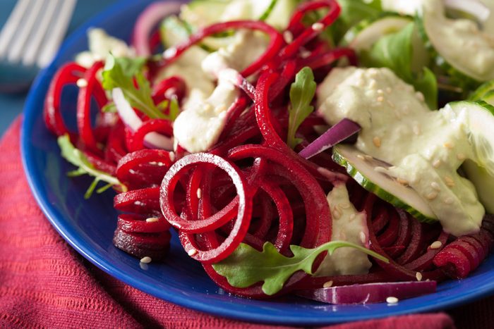 spiralized beet and cucumber salad with avocado dressing