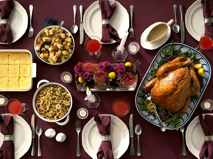 Image of traditional Thanksgiving table with classic Thanksgiving dishes.