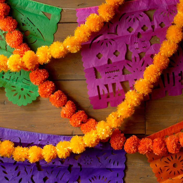 Authentic Day Of The Dead Party decorations and marigold flowers