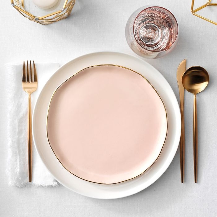 blush pink and rose gold table setting