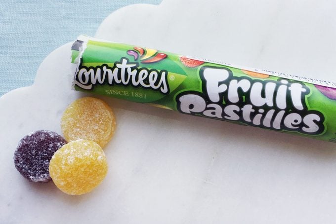Rowntree's Fruit Pastilles on a marble surface with a blue tablecloth