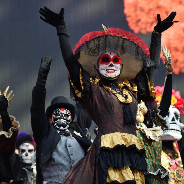 Participants in traditional clothing during Day of the dead