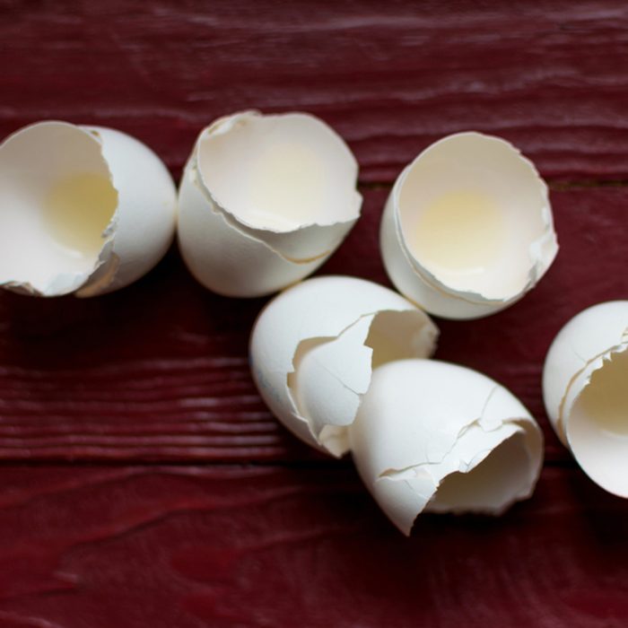 Eggshells on wooden table
