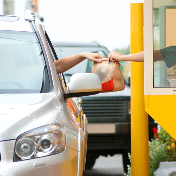 Drive thru fast food restaurant.(motion blur); Shutterstock ID 38753659