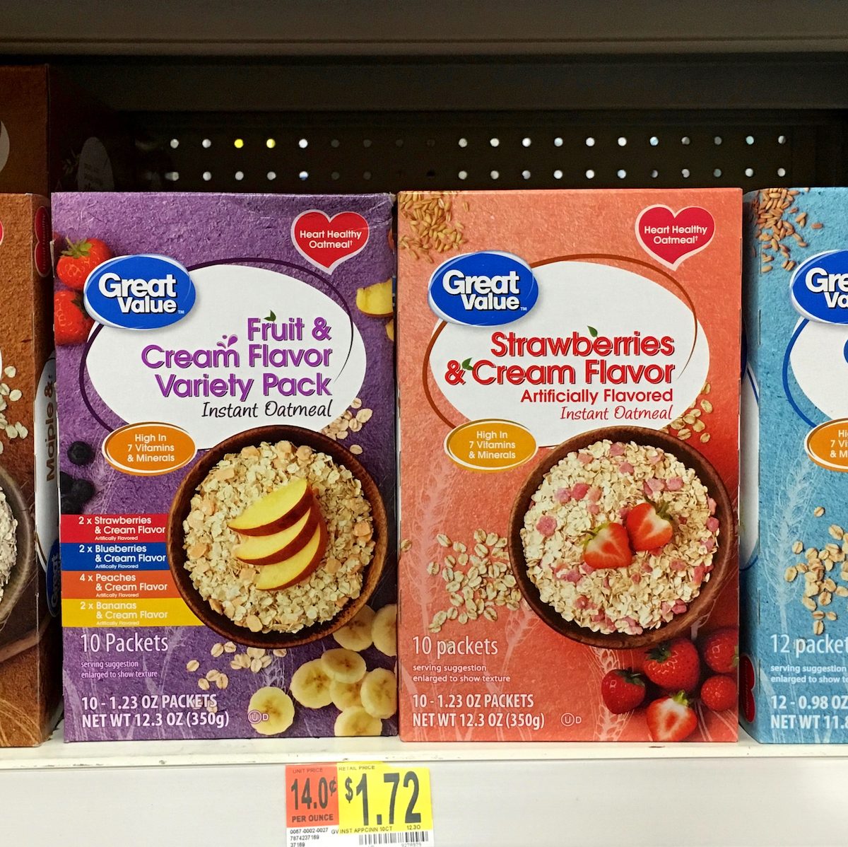 Grocery store shelf with boxes of Great Value generic flavored instant Oatmeal packages. Great Value is a Walmart brand product.