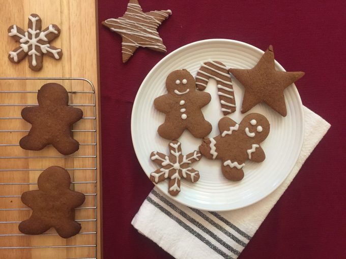 gingerbread cookies on plate and cooling on a rack