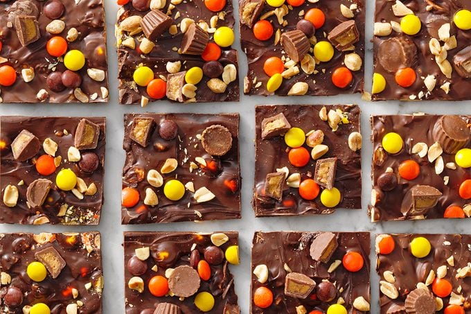 peanut butter cup chocolate peanut bark cut into squares