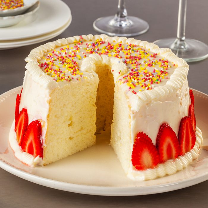 Angel food cake, or angel cake, is a type of sponge cake made with stiffly beaten egg whites with no addition of butter.; Shutterstock ID 451955008; Job (TFH, TOH, RD, BNB, CWM, CM): TOH